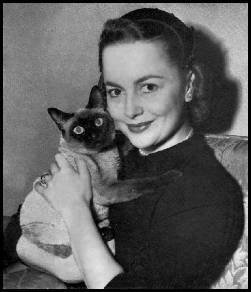 Catherine poses with her traveling Companion Olivia de Havilland 